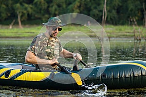 Rowing in inflatable boat