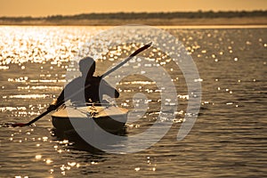 Rowing at sunset