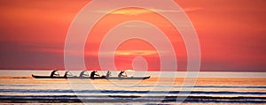 Rowing at sunset on the Indian Ocean, western Australia photo