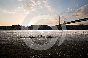 Rowing team at sunset