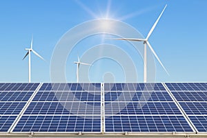 Rows array of polycrystalline silicon solar panels and wind turbines generating electricity in hybrid power plant systems station