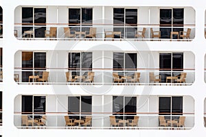 Rows of balconies on board of cruise liner