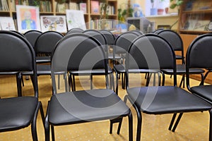 Rows of black chairs