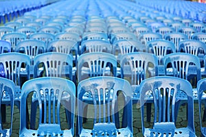 Rows of blue color chairs