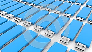 Rows of blue usb flash drives on white