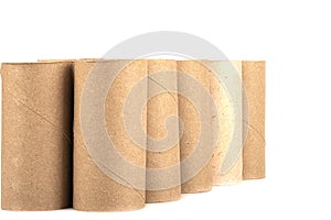 Rows of cardboard rolls from toilet paper isolated on white background.