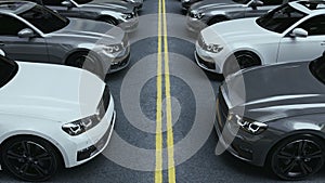 Rows of cars parked neatly in the parking lot.