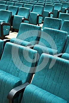 Rows of chairs in auditorium