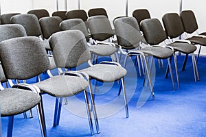 Rows of chairs at a conference