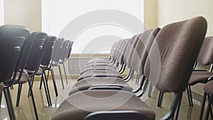 Rows of chairs in the conference room