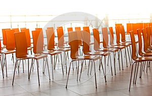 Rows of chairs - meeting background. Selective focus