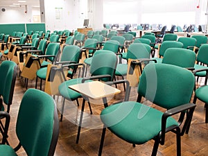 Rows of chairs in a university classroom