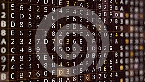 Rows of changing symbols, hacking a password on black background, seamless loop. Animation. Abstract moving random