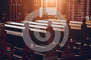 Rows of church benches at the old european catholic church.