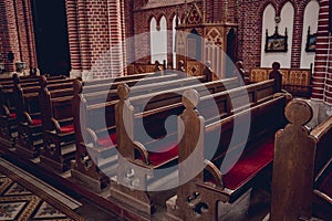 Rows of church benches at the old european catholic church.