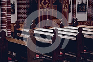 Rows of church benches at the old european catholic church.