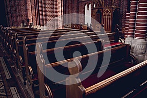 Rows of church benches at the old european catholic church.