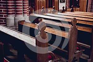 Rows of church benches at the old european catholic church.