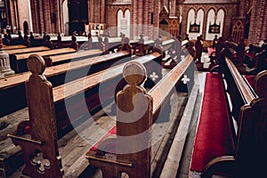 Rows of church benches at the old european catholic church.