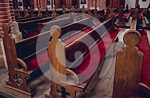 Rows of church benches at the old european catholic church.