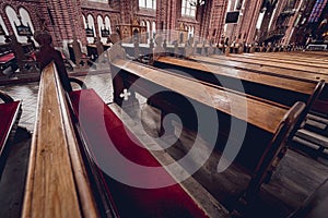 Rows of church benches at the old european catholic church.