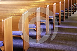 Rows of Church Pews in an Empty Church Sanctuary