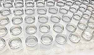 Rows of clear glass drinking glasses