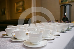 Rows of coffee or tea cups for background