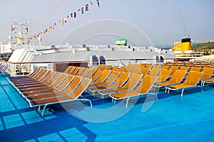 Rows of deck chairs on cruise ship