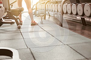 Rows of dumbbells in the gym