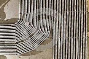 Rows of electrical cables laid in the corrugates