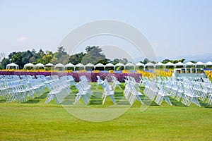 Rows of empty chair seats installed for outdoor event