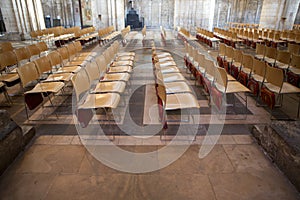 Rows of empty chairs inside Ely Cathedral