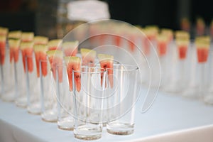 Rows of empty glasses prepared for tasting