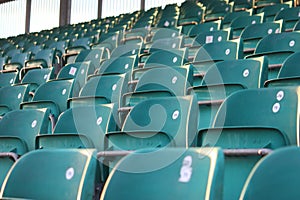 Rows of empty seats in a grandstand