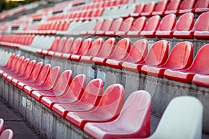 Rows of empty seats in a sports stadium