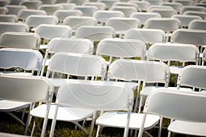 Rows of Empty White chairs