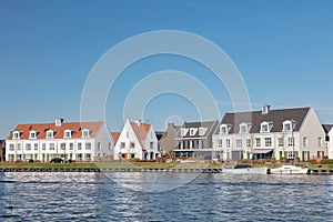 Rows of family homes located on the Veluwemeer waterfront in Harderwijk, The Netherlands