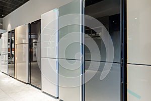 Rows of fridges in household appliance store