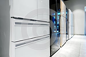 Rows of fridges in household appliance store