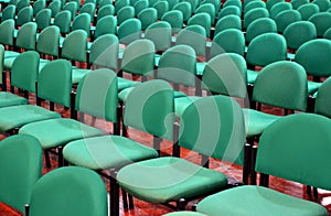 Rows of Green Chairs in a Hall