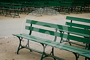 Rows of Green park Benches