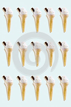 Rows of icecreams on colored background studio shot