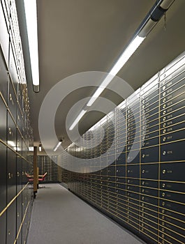 Rows of luxurious safe deposit boxes photo