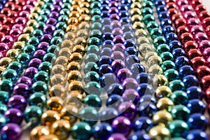 Rows of Mardi Gras beads photo