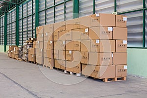 The rows of material boxes or product boxes in warehouse area ready for shipment.