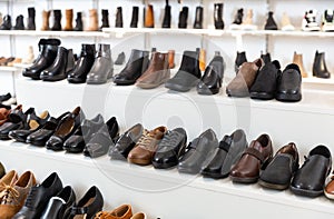 Rows of new boots in shoeshop