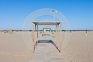 Rows of the palm leaf sun shades on the beach