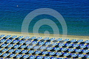 Rows of parasols on beach