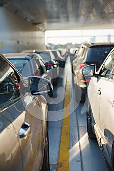 Rows of parked cars during transportation by ferry across the strait.